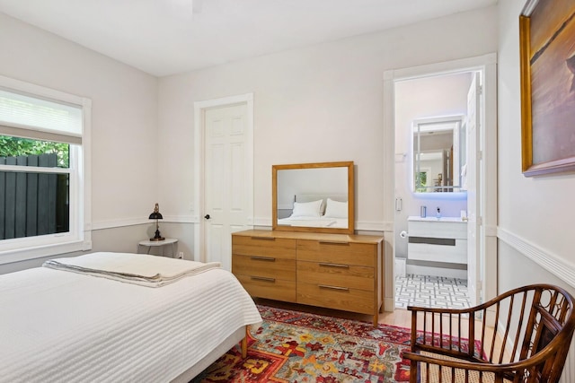 bedroom featuring wood-type flooring and a closet