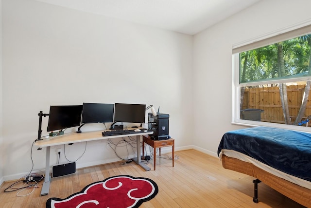 bedroom with light wood-type flooring