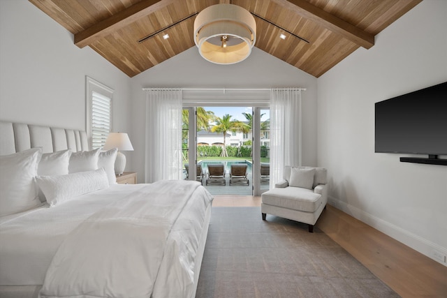 bedroom featuring hardwood / wood-style flooring, wood ceiling, access to outside, and multiple windows