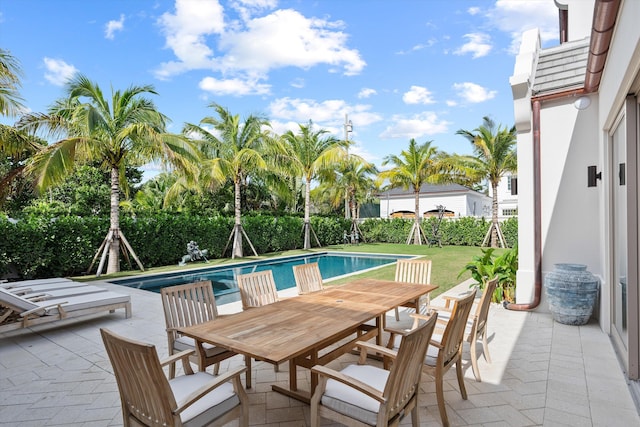 view of swimming pool featuring a patio