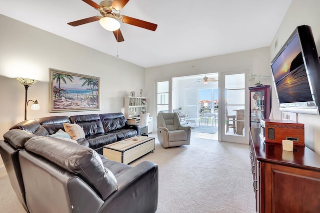 1 Harbour Isle Dr E Unit Ph2, Hutchinson Island, FL 34949 - living room featuring light carpet and ceiling fan