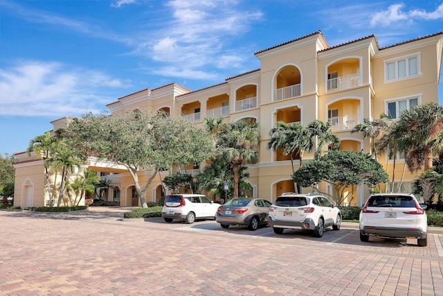 1 Harbour Isle Dr E Unit Ph2, Hutchinson Island, FL 34949 - view of building exterior featuring uncovered parking