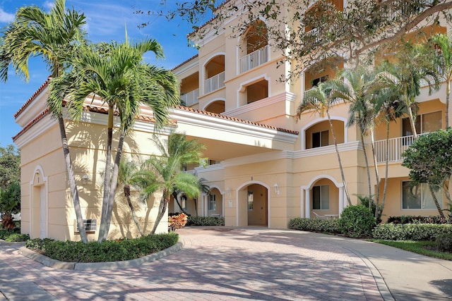 1 Harbour Isle Dr E Unit Ph2, Hutchinson Island, FL 34949 - view of property featuring decorative driveway