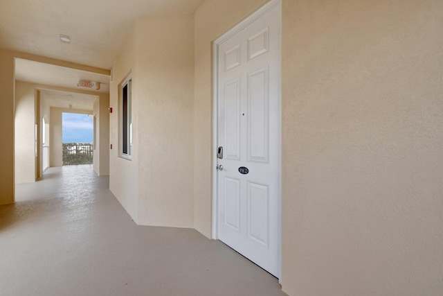 1 Harbour Isle Dr E Unit Ph2, Hutchinson Island, FL 34949 - hall with finished concrete flooring