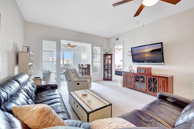 living room featuring light colored carpet