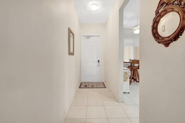 1 Harbour Isle Dr E Unit Ph2, Hutchinson Island, FL 34949 - hall featuring light tile patterned flooring and baseboards