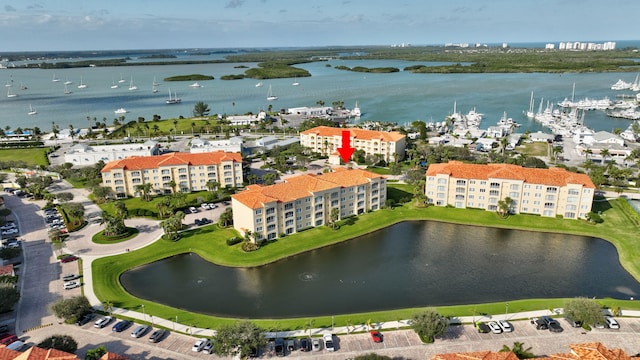 drone / aerial view featuring a water view