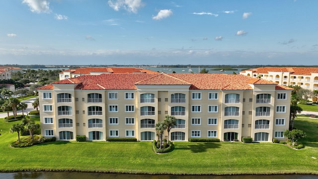 view of property with a water view