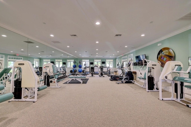 1 Harbour Isle Dr E Unit Ph2, Hutchinson Island, FL 34949 - workout area featuring ornamental molding, recessed lighting, healthy amount of natural light, and carpet floors