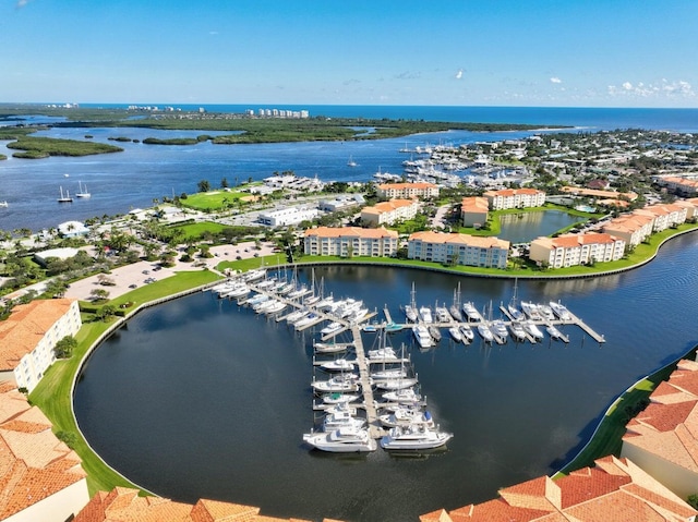 birds eye view of property featuring a water view