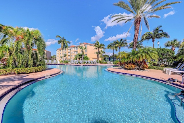 1 Harbour Isle Dr E Unit Ph2, Hutchinson Island, FL 34949 - community pool with a patio