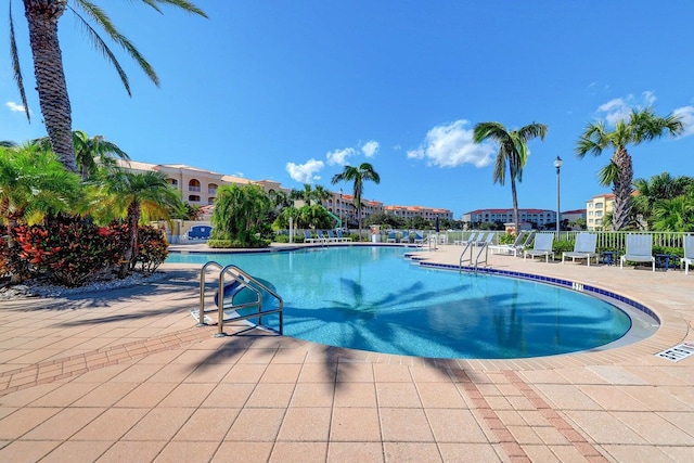 view of pool featuring a patio area