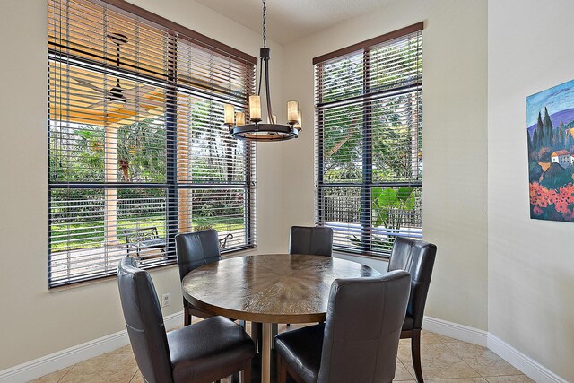 tiled living room featuring a towering ceiling