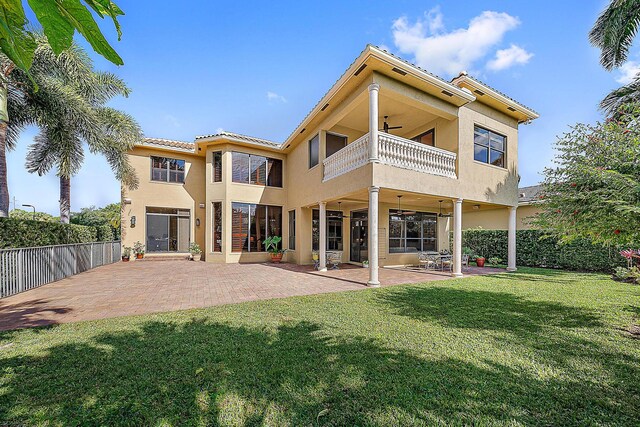 mediterranean / spanish-style home with a garage