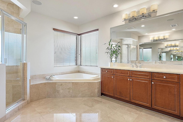 bathroom with vanity, tile patterned floors, and independent shower and bath