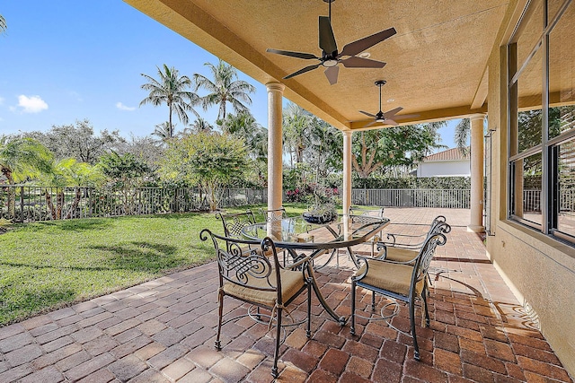 view of patio featuring ceiling fan