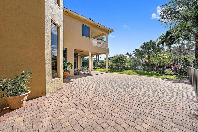 mediterranean / spanish home with a garage and a front lawn