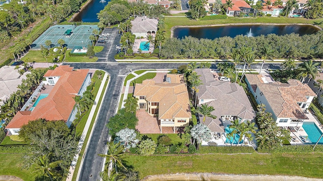 aerial view with a water view and a residential view