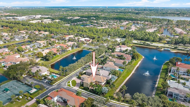 aerial view featuring a water view and a residential view