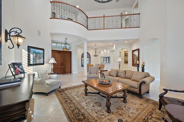 kitchen featuring wine cooler, stainless steel dishwasher, sink, and hanging light fixtures