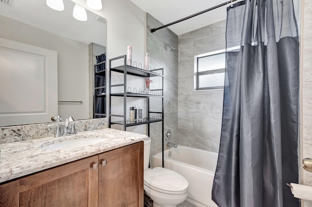 full bathroom featuring toilet, vanity, and shower / tub combo with curtain