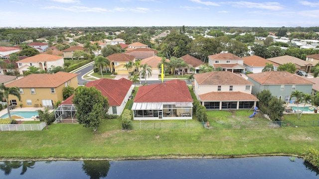 aerial view featuring a water view and a residential view