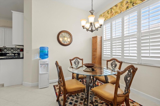 dining space featuring an inviting chandelier