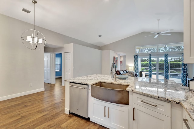 kitchen with white cabinetry, dishwasher, sink, hanging light fixtures, and ceiling fan with notable chandelier