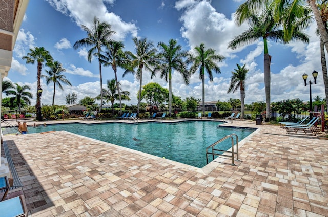 view of swimming pool featuring a patio