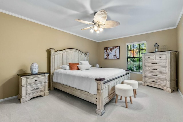 bedroom with ceiling fan, light carpet, and ornamental molding