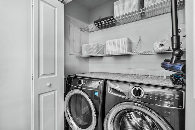 laundry room with washer and clothes dryer