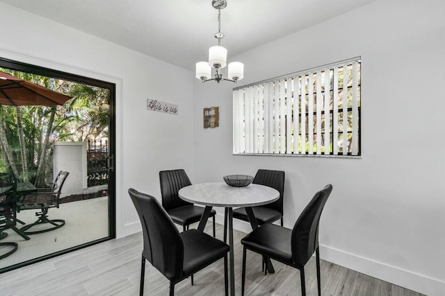 dining area featuring a chandelier