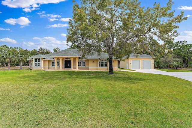 ranch-style home with a front lawn and a garage