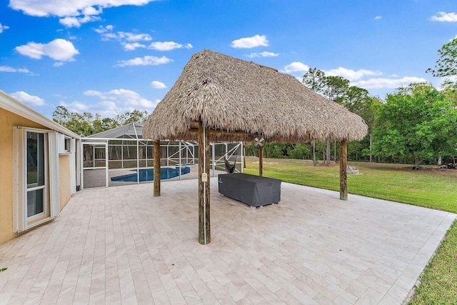 view of patio with a gazebo and a lanai