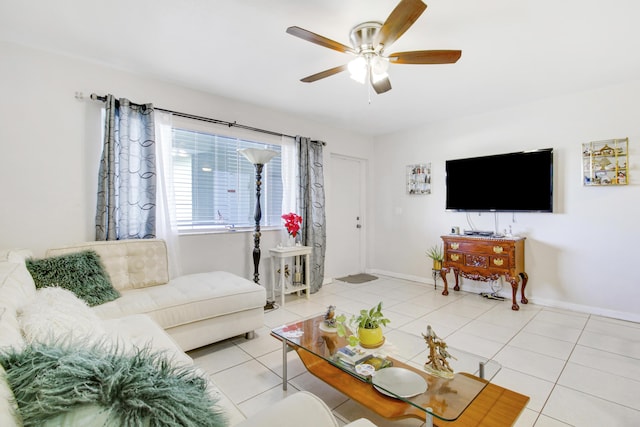 tiled living room featuring ceiling fan