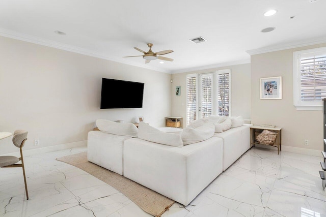 living room with plenty of natural light, ceiling fan, and crown molding