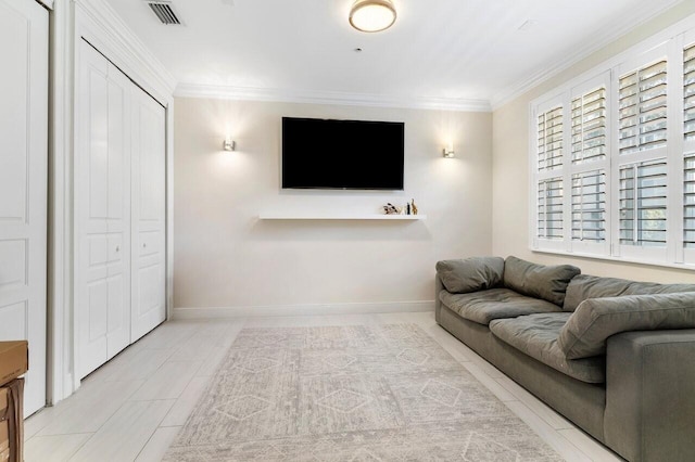 living room with crown molding