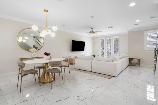 living room with ceiling fan with notable chandelier, plenty of natural light, and crown molding