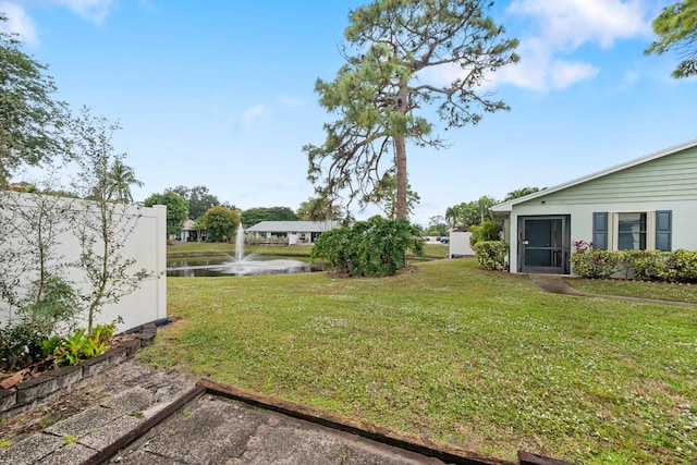 view of yard featuring a water view