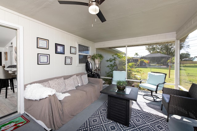 interior space featuring ceiling fan