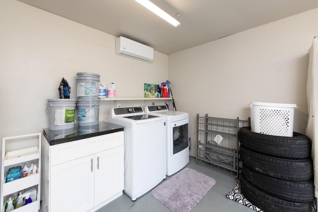 laundry area featuring a wall mounted air conditioner and washing machine and clothes dryer