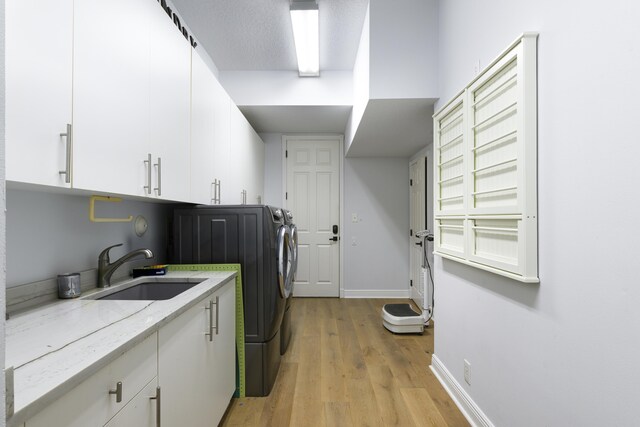 bathroom featuring vanity, a bath, tile walls, and a wealth of natural light