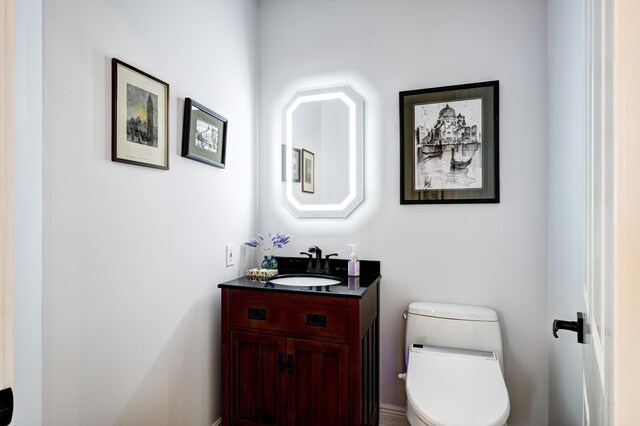 bedroom with access to exterior, ceiling fan, light hardwood / wood-style flooring, and a textured ceiling