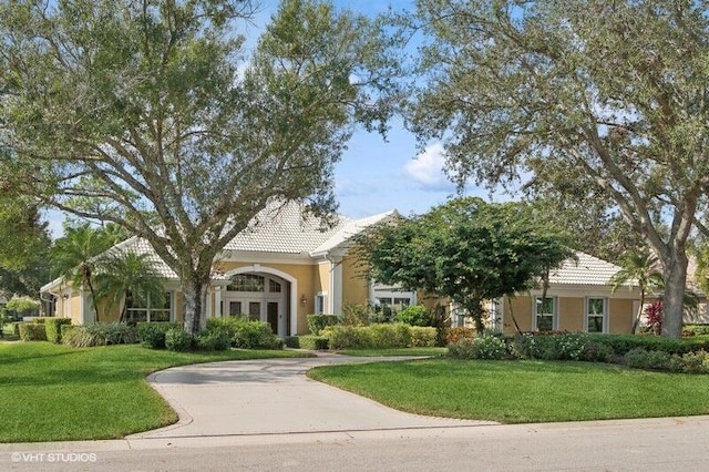 view of front facade with a front lawn