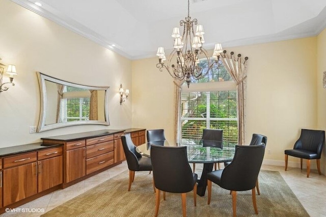 dining area with ornamental molding, a notable chandelier, and light tile patterned flooring