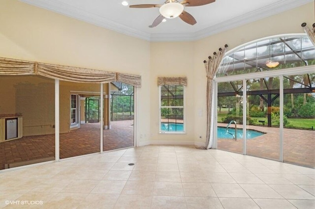 interior space with ceiling fan and a swimming pool