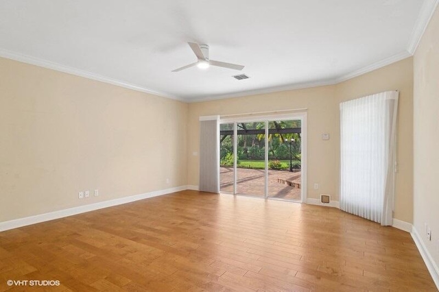 unfurnished room with ceiling fan, light wood-type flooring, and crown molding