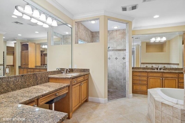 bathroom featuring tile patterned floors, crown molding, vanity, and shower with separate bathtub