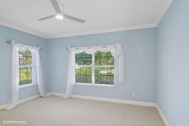 unfurnished room featuring light carpet, ceiling fan, and ornamental molding