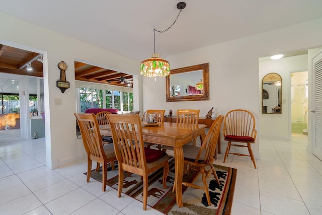 1503 Shirley Ct, Lake Worth, FL 33461 - dining room with light tile patterned flooring, ceiling fan, and baseboards